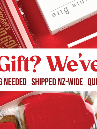 Promotional banner for gift delivery service with red and white packaging and text.