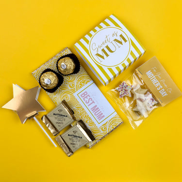 Gift set with 'Best Mum' and 'Sweets for Mum' text on a yellow background