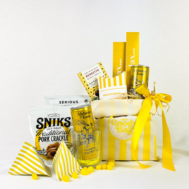 Yellow Goody Bag with sweets, treats and driinks. Made for sharing.